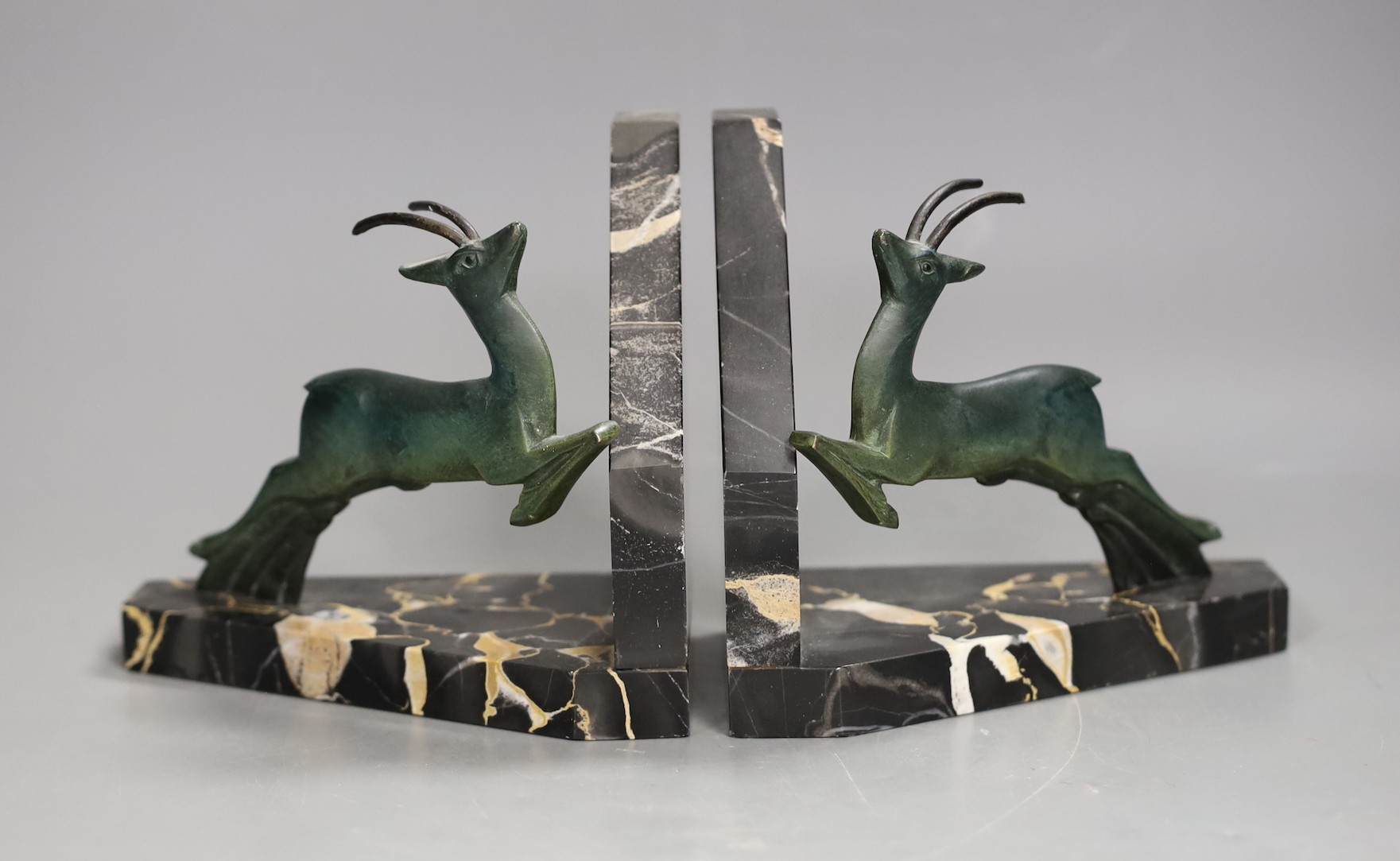 A pair of Art Deco bronze 'antelope' bookends. 12.5cm high